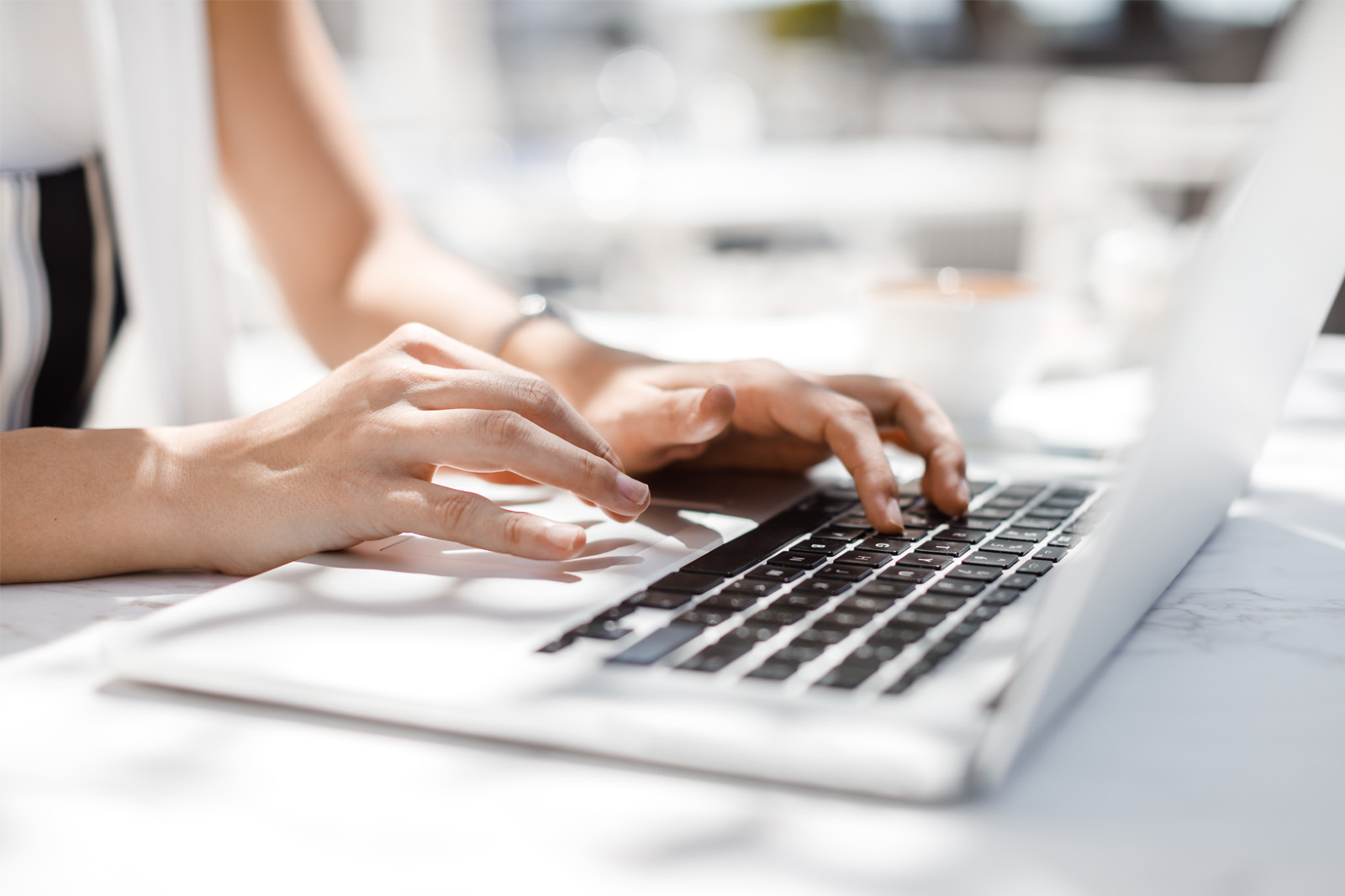 A Woman Working on Laptop